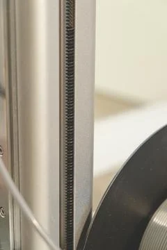 Exploring the intricate details of a 3D printer during its operation 写真素材