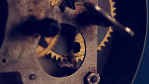 Exploring the intricate details of vintage clockwork mechanisms revealing 動画素材 297597929