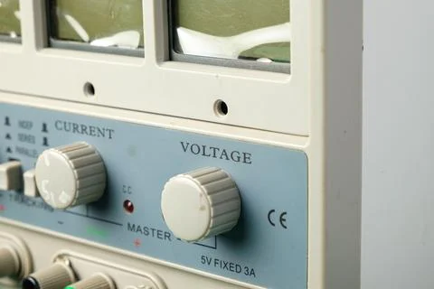 Exploring the intricate details of a voltage control device in a lab setting Stock Photos