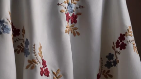 Exploring intricate hand-embroidered textile designs with floral patterns Stock Footage 293225174