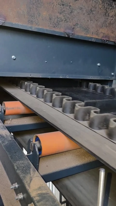 Exploring the Intricate Mechanisms of Conveyor Systems in Action Stock Footage 345365138