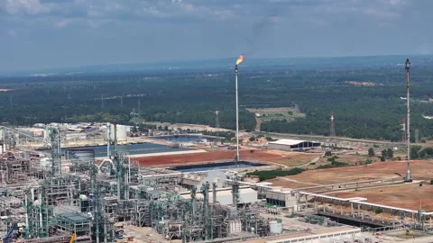 Exploring the intricate operations of an oil refinery in a vast landscape Stock Footage 334023755