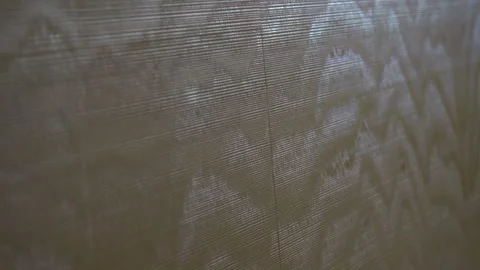 Exploring intricate wall textures in a modern interior design setting Stock Footage 266960370