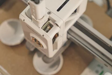 Exploring the intricate workings of a 3D printer during a creative project 写真素材