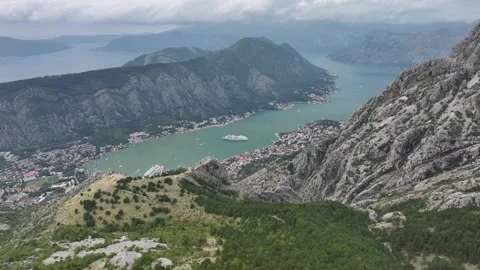 Exploring Kotor Bay's breathtaking views from the mountains with lush greenery Stock Footage 287774169