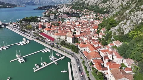Exploring Kotor Old Town in Montenegro with stunning views of the bay and Stock Footage 287780935