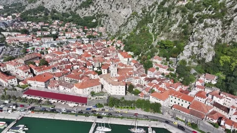 Exploring Kotor Old Town's stunning architecture and coastal views during a Stock Footage 287780951
