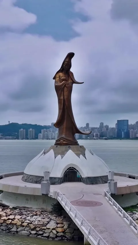 Exploring Kun Lam Statue in Macau from a drone view Vídeos de archivo 335075357