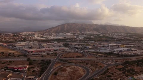 Exploring the landscape of a city with hills and roads during evening light.. Stock Footage 340193127