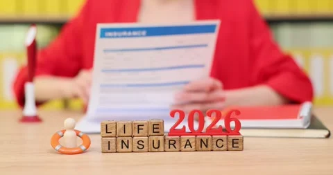 Exploring life insurance options for 2026 during an informative session at a Stock Footage 320471876