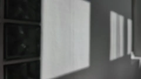 Exploring Light Reflections on a Glass Block Wall in an Indoor Setting Stock Footage 288006152