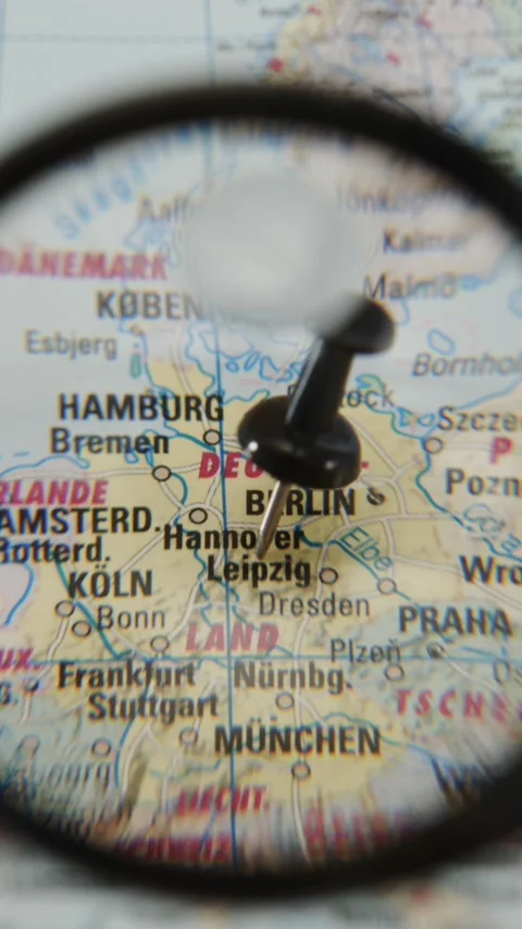 Exploring locations on a map with a pushpin in Leipzig and other German cities Video stock 343288675