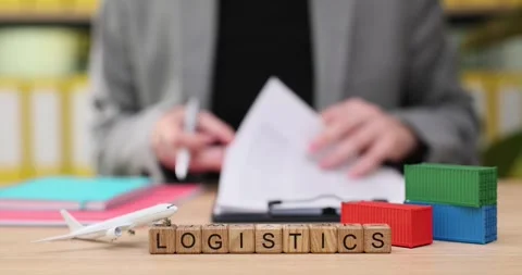 Exploring logistics management practices with creative paperwork and colorful Stock Footage 319066357