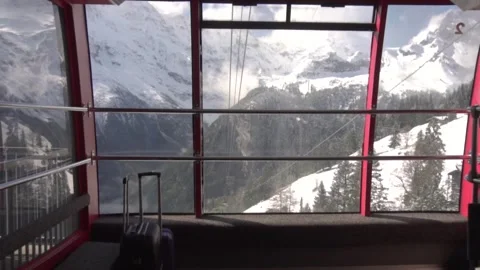 Exploring majestic mountain views from inside a cable car Video stock 291881432
