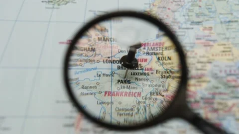 Exploring the map of Europe with focus on Paris and London Stock-Footage 343289865