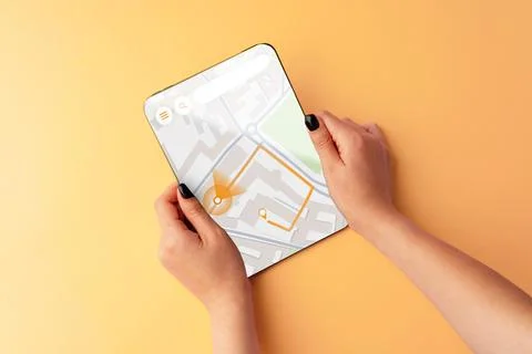 Exploring a map to plan a taxi route for travel in a city during the day Stock Photos