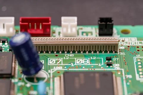 Exploring the micro world of computer circuit boards, where vibrant colors .. Stock Photos