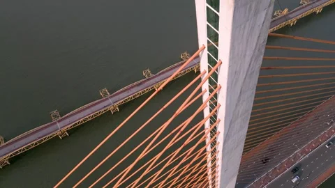 Exploring modern architecture along the river with a striking bridge Video stock 309736082