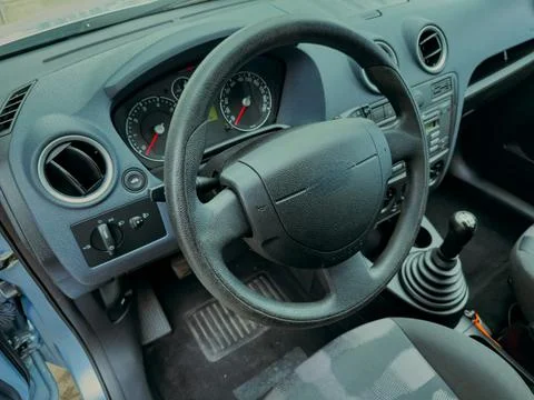 Exploring the modern interior design of a compact car featuring high-tech i.. Photos