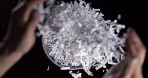 Exploring motion in slow motion paper shredding Stock Footage 344986236