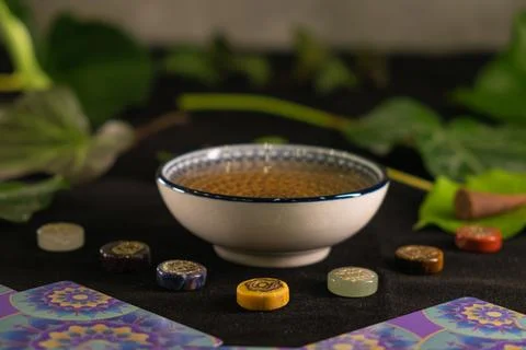 Exploring the Mystical Powers of Chakras Through Herbal Infusion Rituals Stock Photos