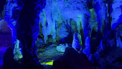 Exploring mystical underground cave formations Stock Footage 340819860