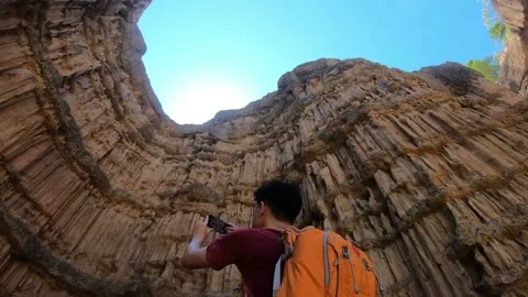 Exploring Natural Rock Formations in Stunning Landscape Stock Footage 314593749