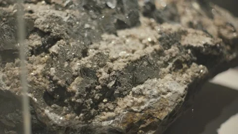 Exploring natural rock forms and textures at a geology exhibit in a local museum Stock Footage 334009089