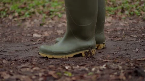 Exploring Natures Beauty While Walking in the Mud Enjoying Comfortable Green Stock Footage 308885751