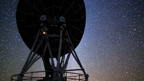 Exploring the night sky with radar technology at an observatory during starry co Stock Footage 296190616
