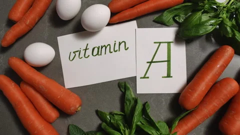 Exploring the Nutritional Benefits of Consuming Vitamin A from Delicious Carrots Stock Footage 310169838