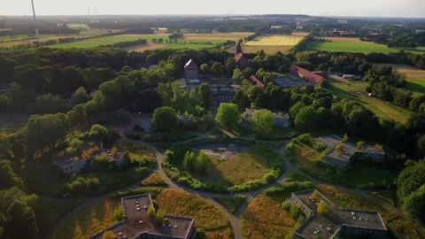 Exploring an old abandoned area with buildings in the countryside during suns Stock Footage 339783186