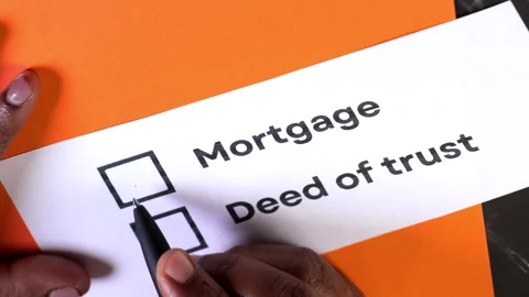 Exploring options for mortgage and deed of trust in finance Stock Footage 302210924