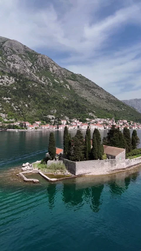 Exploring Our Lady of the Rocks by Dron.Vertical video Stock Footage 300760620