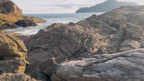 Exploring a paradisiacal island, navigating through the rocks 스톡 동영상 263536279