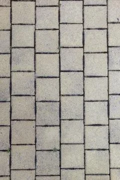 Exploring the Patterned Texture of a Neatly Arranged Sidewalk in Broad Daylig Stock Photos