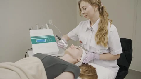 Exploring permanent cosmetology techniques in a serene beauty salon setting Stock Footage 309192854