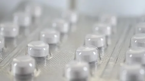 Exploring pharmaceutical packaging in a lab environment Stock Footage 311907336