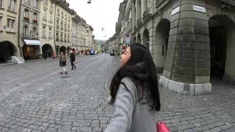 Exploring a Picturesque Cobblestone Street Stock Footage 314786962
