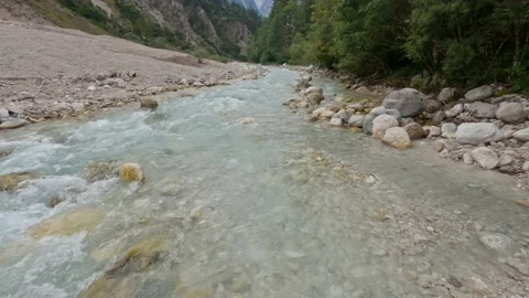 Exploring the picturesque landscape of a beautiful mountain river Stock Footage 162142802