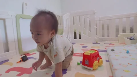 Exploring Playtime in a Colorful Nursery Stock Footage 341142790