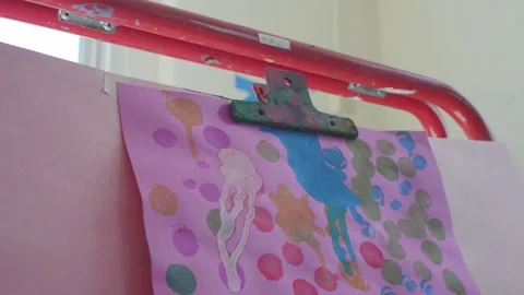 Exploring A Preschool Art Classroom, Paint Brushes, Easel, And Paintings Stock Footage 170386914
