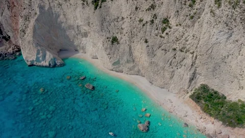 Exploring the pristine beauty of Myzithres Beach in Keri, Zakynthos under a Stock Footage 337361712