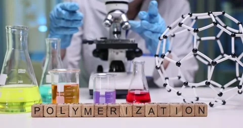 Exploring the Processes of Polymerization Research within a Modern Laboratory Stock Footage 312176524