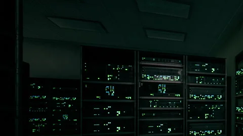 Exploring the Quiet Glow of Server Racks in a Dimly Lit Data Center Stock Footage 347014600