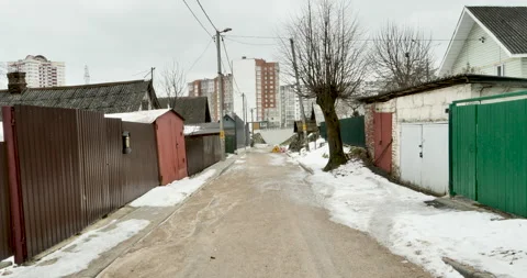 Exploring the Reality of Urban Poverty: Walking through a City Slum Stock Footage 238972322