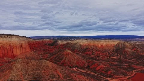 Exploring the red landscapes of Spain under an overcast sky Stock Footage 333114222