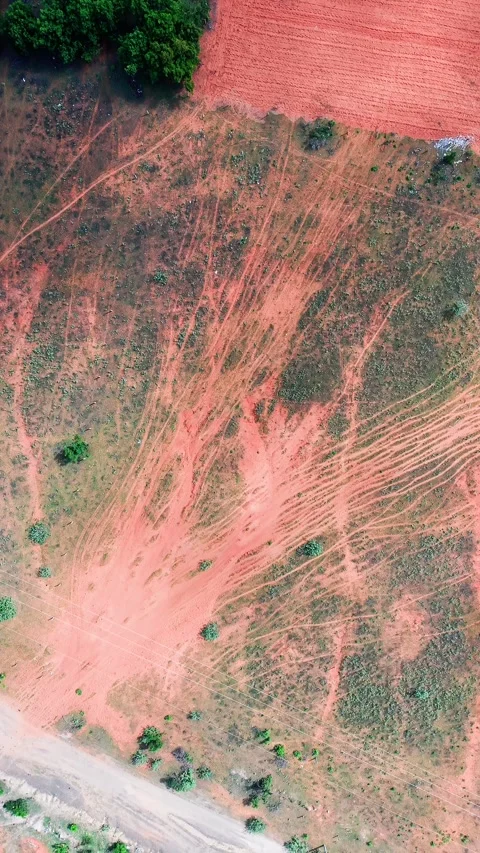 Exploring the red soil patterns in Hoa Thang, Lam Dong during the day Stock Footage 344434145