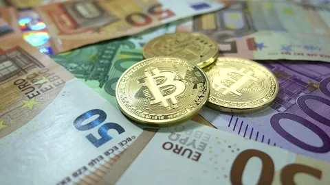 Exploring the relationship between Bitcoin and Euro banknotes Stock Footage 325036894