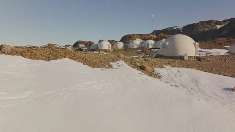 Exploring the remote Antarctica camp base and its frozen landscape Stock Footage 288160644